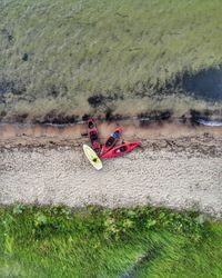 Kayaks set up on sandy beach in Burt Lake State Park