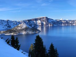 A winter view of a crater lake in Oregon