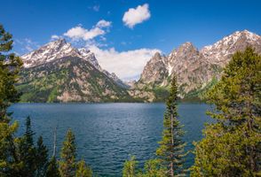 A beautiful blue lake at the foot of the mountains in Grand Teton National Park