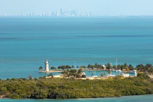 Boca Chita Key lighthouse at Biscayne National Park and the Miami skyline