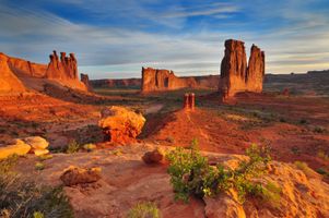 Sunrise overlooking Courthouse Towers in Arches National Park