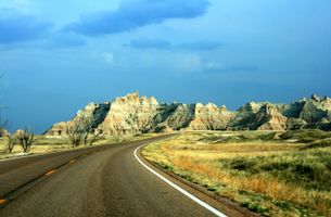 Badlands National Park seen from the road to the park during a cloudy day